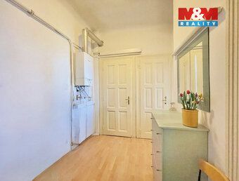 Nabízíme vám ke koupi prostorný byt 2+1 o užitné ploše 68 m²