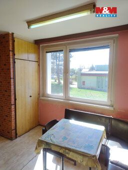 Prodej prostorného bytu 3+1 o užitné ploše 80 m² v centru ob
