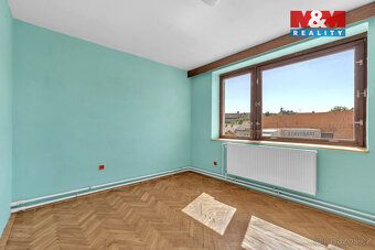 Prodej rodinného domu (užitná plocha 150 m², 7 místností) s 
