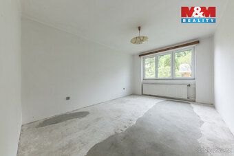 Nabízíme k prodeji rodinný dům na okraji řadové zástavby v B