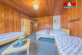 Nabízíme k dlouhodobému pronájmu unikátní dřevěnou chalupu v