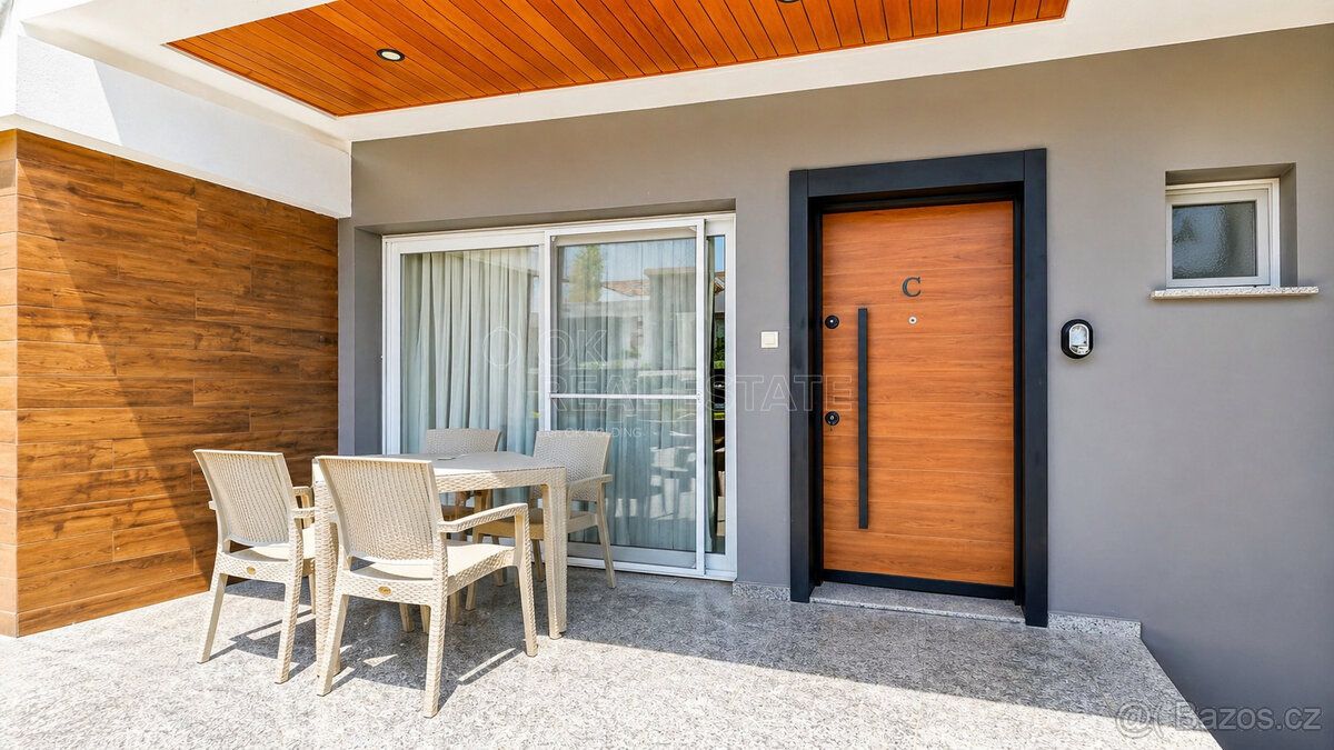 Moderní apartmán 1+1 se soukromou zahradou v oblíbeném rezid