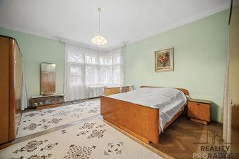 Unikátní byt 3+1 se soukromou zahradou, garáží a lesy v okol