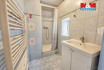 Nabízíme k prodeji samostatně stojící rodinný dům v centru K