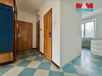 Nabízíme k prodeji prostorný byt s garáží o dispozici 4+1 a 