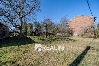 Ev.č. 01077 Nabízíme Vám ke koupi prostorný rodinný dům s ve