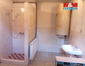 Nabízíme k prodeji samostatně stojící rodinný dům v malebné 