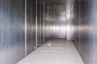 Ev.č. 01255 Výrobní areál s bytovou částí a stavebním pozemk