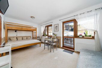 Z obýváku přímo na sjezdovku! Stylový apartmán 1+kk (36,8 m²