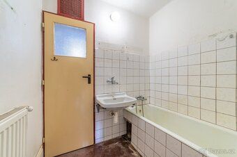 Bytová jednotka o dispozici 3+1 ve druhém patře zděného domu