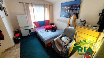 Týnec nad Labem – prodej rodinného domu s menším dvorkem o p