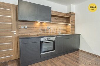 Ve druhém nadzemním podlaží udržovaného cihlového domu v uli
