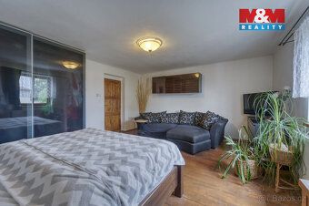 Nabízíme k prodeji prostorný rodinný dům o dispozici 4+kk a 