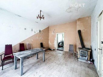 Rodinný dům k rekonstrukci v klidné ulici pár kroků od náměs