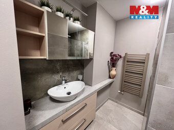 Nabízíme k prodeji prostorný rodinný dům 5+KK v klidné části