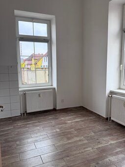 Pronájem bytu 1kk ve Štětí vedle pěší zóny. Nájemné 10.000,-