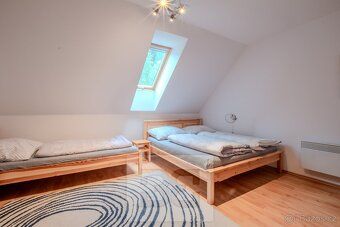 Ev.č. N09409 Nabízíme k pronájmu stylový mezonetový apartmán
