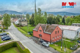 Prodej bytového domu s třemi byty o dispozici 1+1 v prvním N