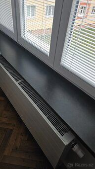 - BYDLETE VE VÝJIMEČNÉM BYTĚ PO NADSTANDARDNÍ REKONSTRUKCI -