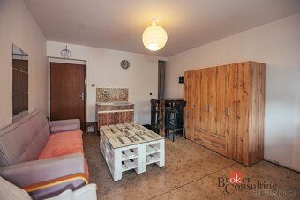 Prodej prostorného rodinného domu 4+1 se zahradou a garáží v