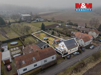 Prodej zajímavého rodinného domu o dispozici 5+1 v klidné a 