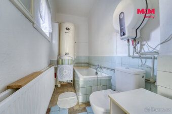 Prodej prostorného rodinného dvoupodlažního domu v centru ob