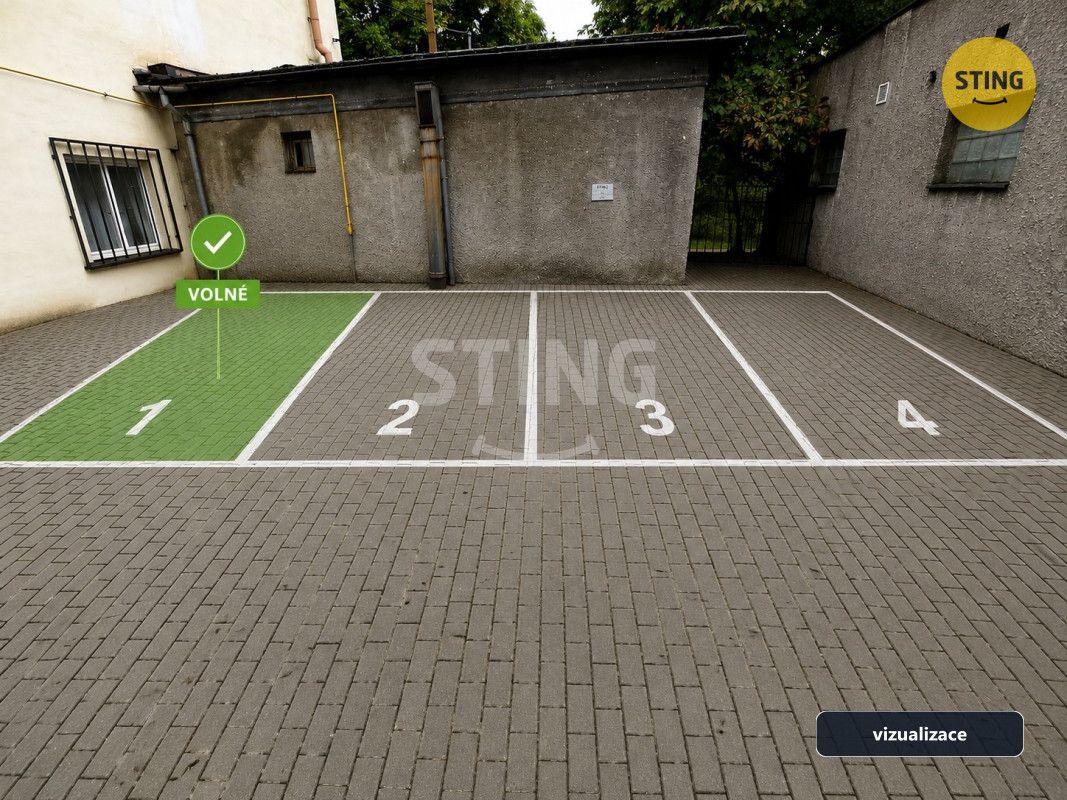 Nabízíme k pronájmu venkovní parkovací místo ve dvoře domu n