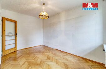 Nabízíme k prodeji prostorný byt 3+1 v bytovém domě v klidné