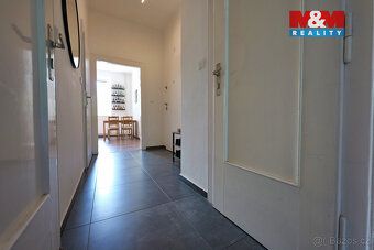 Nabízíme ke koupi rodinný řadový třípodlažní dům se zahradou