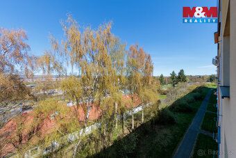 Příjemný, slunný byt ve 4. patře zatepleného a udržovaného d