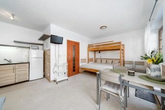 Z obýváku přímo na sjezdovku! Stylový apartmán 1+kk (36,8 m²