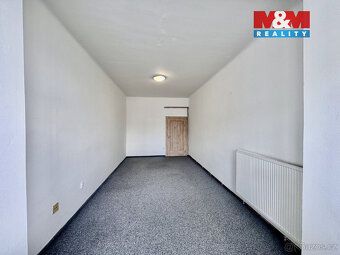 Prodej bytu v osobním vlastnictví v cihlovém bytovém domě v 