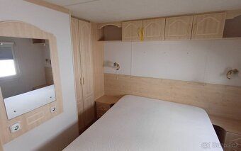 Zateplený mobilheim v TOP stavu o rozměru 9 x 3 m s WC a kou