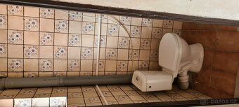 Dvougenerační rodinný dům o velikosti 7 + 2 a rozloze 180 m2