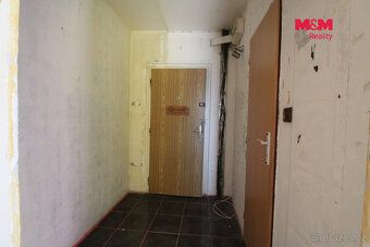 We offer for sale a cooperative apartment of 2+kk layout and area 