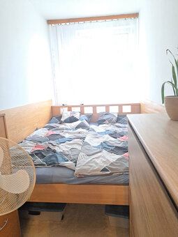 Apartment has undergone partial reconstruction and offers comfortable living for an extended family.