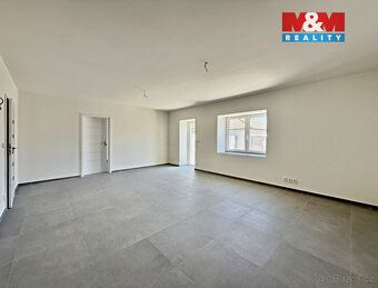 Nabízíme k prodeji řadový rodinný dům 4kk v Podbořanech. Dům