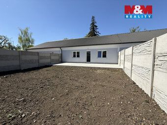 Nabízíme k prodeji řadový rodinný dům 4kk v Podbořanech. Dům