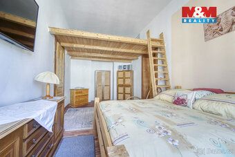 Nabízíme k prodeji prostorný byt o dispozici 3+1 a užitné pl
