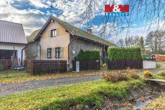 Draženou nemovitostí je přízemní, částečně podsklepený rodin