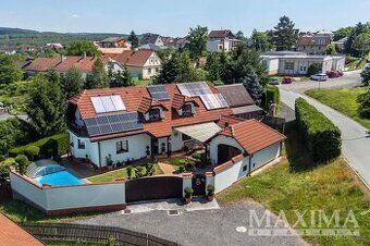 Я хотів би придбати заміський будинок у районі Рокицан