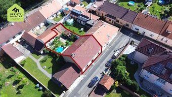 Я хотів би придбати заміський будинок у районі Рокицан