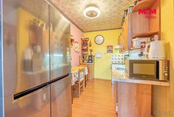Prodej bytu 3kk o užitné ploše 65 m² v 8. patře panelového d