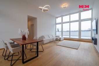 We offer for sale an unique rooftop apartment unit 4+kk in