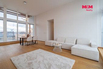 We offer for sale an unique rooftop apartment unit 4+kk in