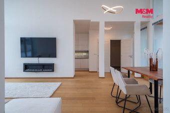 We offer for sale an unique rooftop apartment unit 4+kk in