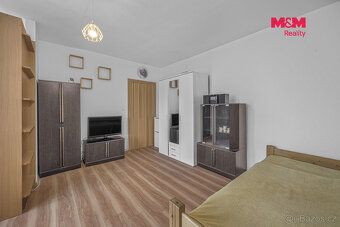 We offer for sale a bright apartment 1 + kk with balcony