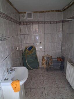 Basement usable area includes hallway open plan kitchen and