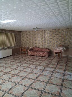 Basement usable area includes hallway open plan kitchen and