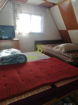 Pozemok s murovanou chatou v Rači. Pozemok s murovanou chato